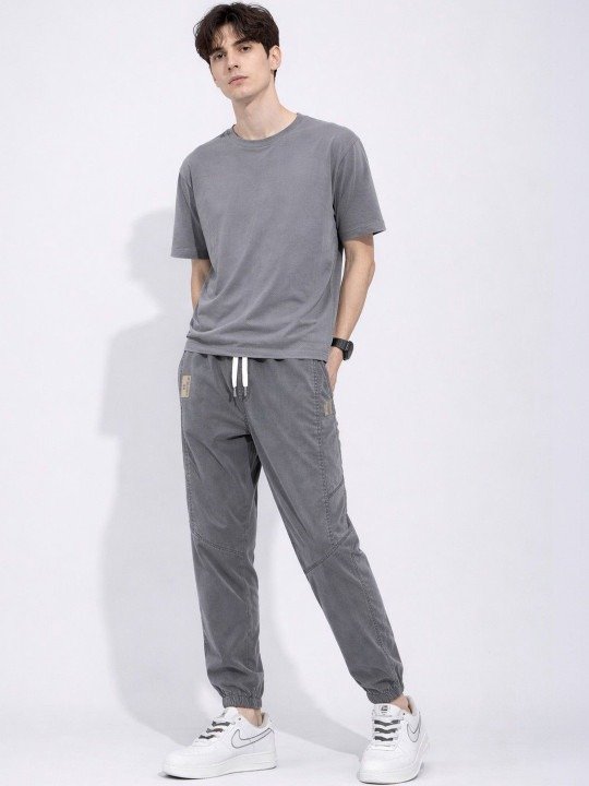 Minimal Mid Rise Light Fade Jogger Jeans