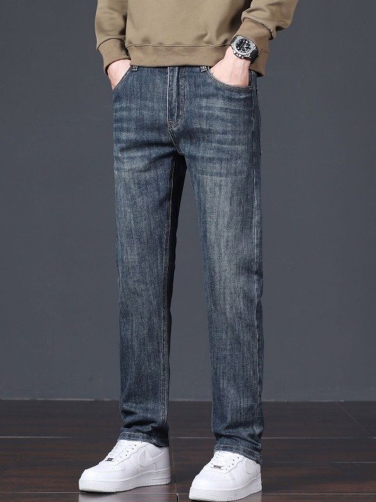 Essential Slim Fit Mid Rise Light Fade Jeans